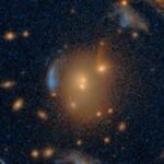 Astronomers Discover Giant Einstein Cross Amid Rare Galaxy Formation